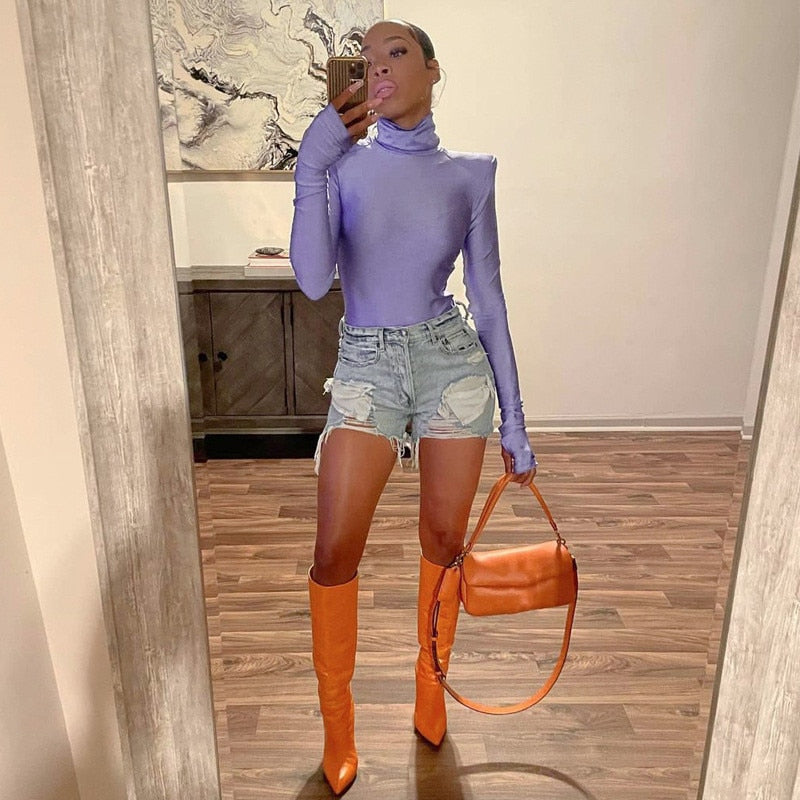 Ksenia – Bodysuit de cuello alto con hombreras