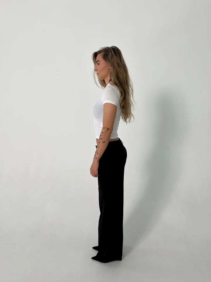 Vittoria – Pantalones a Cintura Alta con Piernas Anchas y Bolsillos