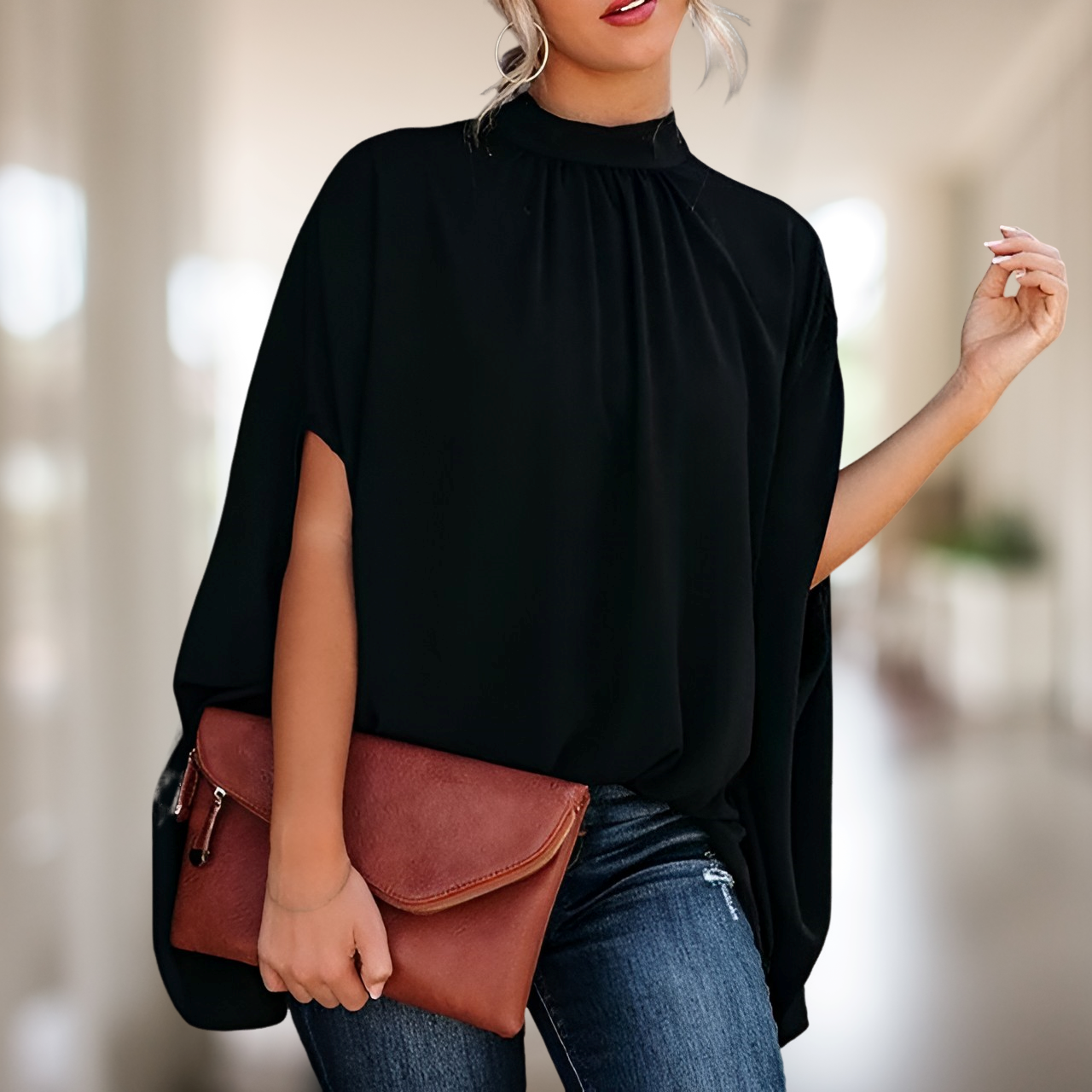 Zara – Blusa holgada con escote en V