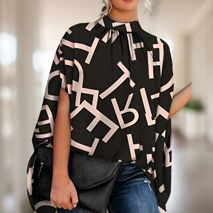 Zara – Blusa holgada con escote en V
