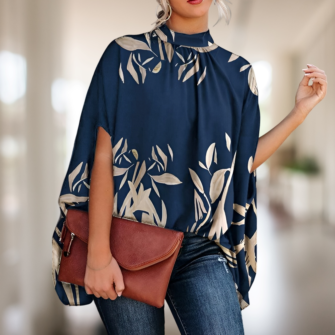 Zara – Blusa holgada con escote en V