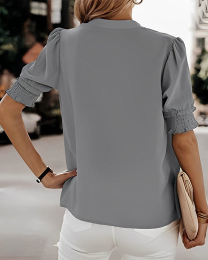 Sophia – Blusa con cuello en V y mangas cortas