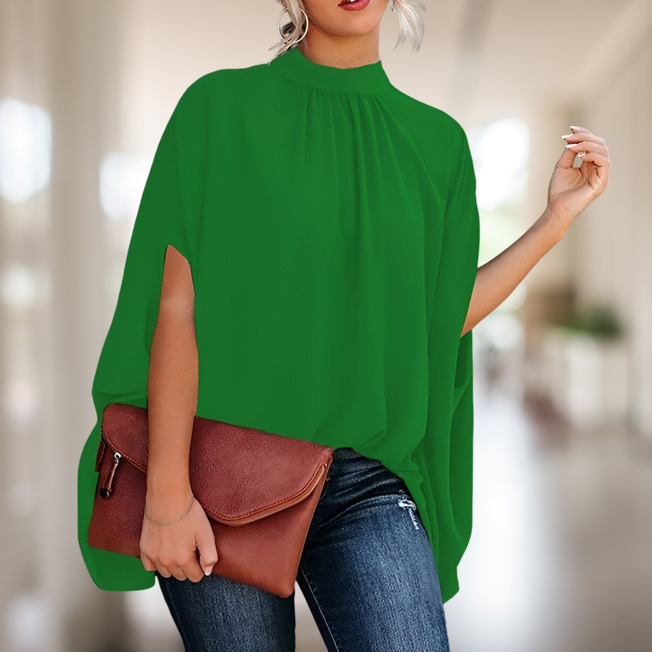 Zara – Blusa holgada con escote en V