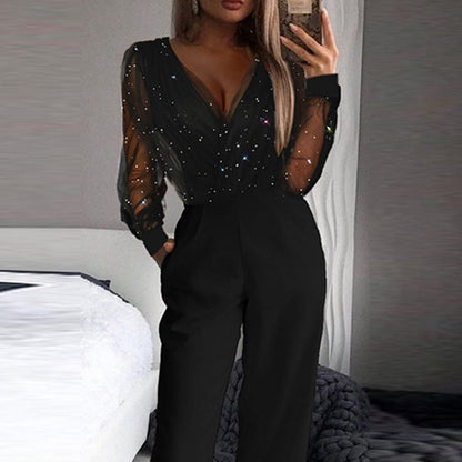 Kaye – Mono con escote en V y pantalones anchos